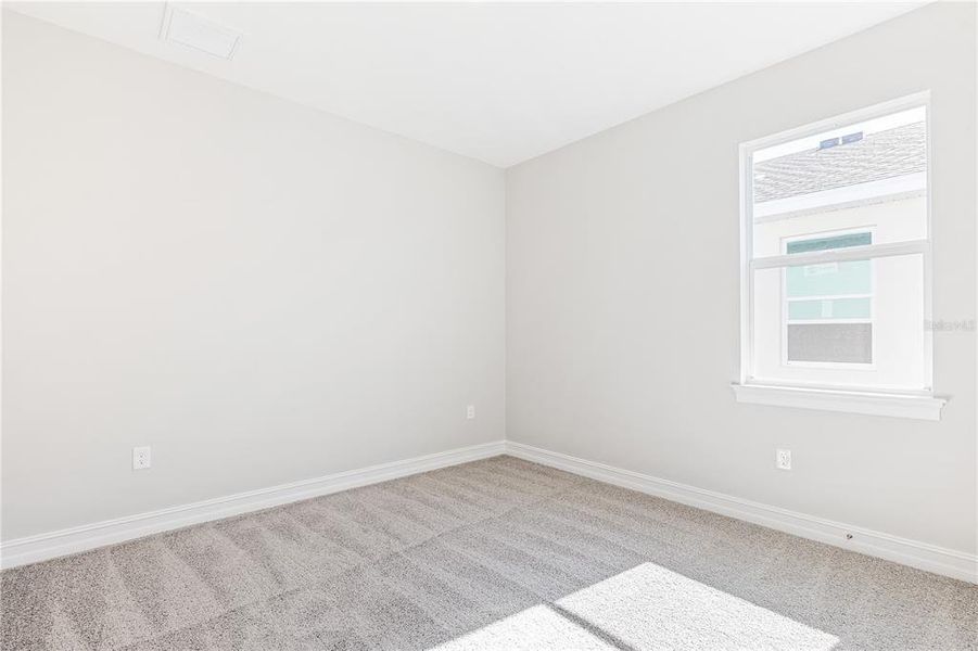 Spacious, unfurnished interior of a new home in Coral Lakes - Tradition & Express, Punta Gorda (Image 19).