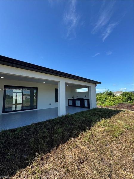 Front exterior of a new home in , Lehigh Acres, FL, highlighting curb appeal (Image 21). Front exterior of a new home in , Lehigh Acres, FL, highlighting curb appeal (Image 21).