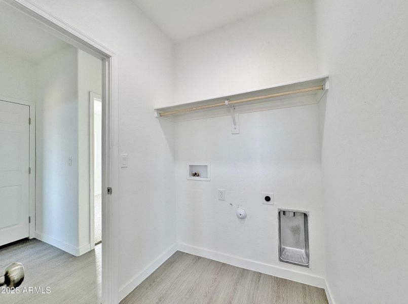 Utility room off kitchen & BR's