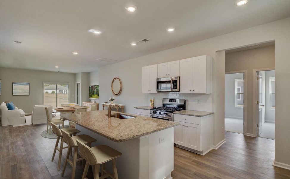 Furnished interior view inside a new home in Lindera Preserve at Cane Bay Plantation: American Dream Series - Ph 15, Summerville (Image 6). Furnished interior view inside a new home in Lindera Preserve at Cane Bay Plantation: American Dream Series - Ph 15, Summerville (Image 6).
