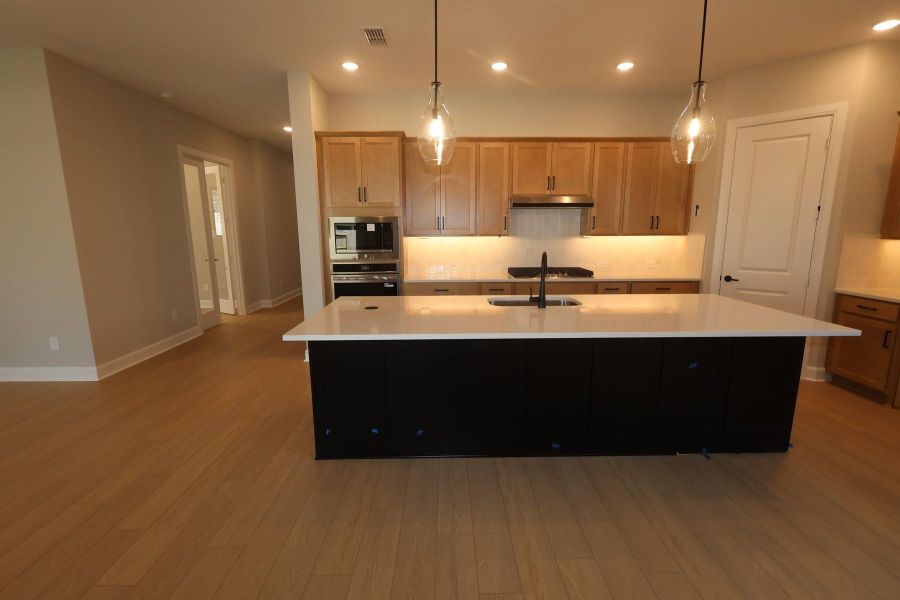 Furnished interior view inside a new home in Riceland - Enclave Collection, Mont Belvieu (Image 8).