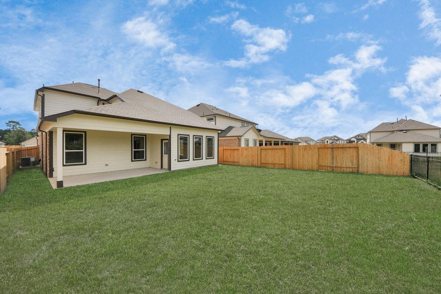 Come and see this spacious backyard with its beautiful covered patio. There is plenty of room for the kids to play and adults to relax. Perfect for your outdoor living space, patio furniture, bbq pit, and so much more. The possibilities are endless! Come and see this spacious backyard with its beautiful covered patio. There is plenty of room for the kids to play and adults to relax. Perfect for your outdoor living space, patio furniture, bbq pit, and so much more. The possibilities are endless!