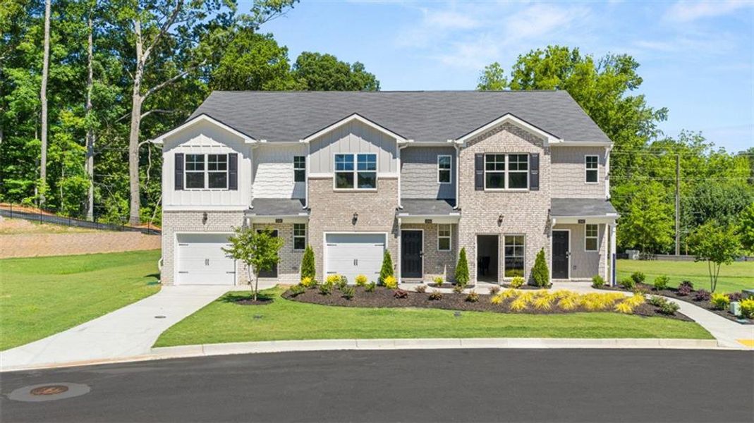 Front exterior of a new home in The Gables at Agricultural Village, Perry, GA, highlighting curb appeal (Image 1).