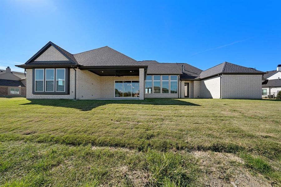 Exterior details and patio area of a home in King's Crossing - Phase 3, Parker (Image 4).