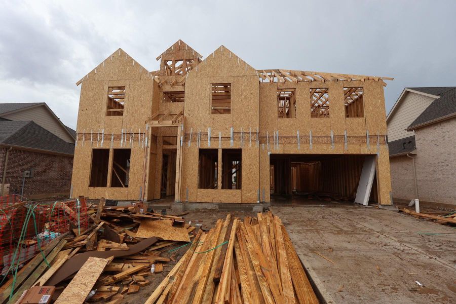 Two story home with 5 beds, 4.5 baths, and 4 car tandem garage