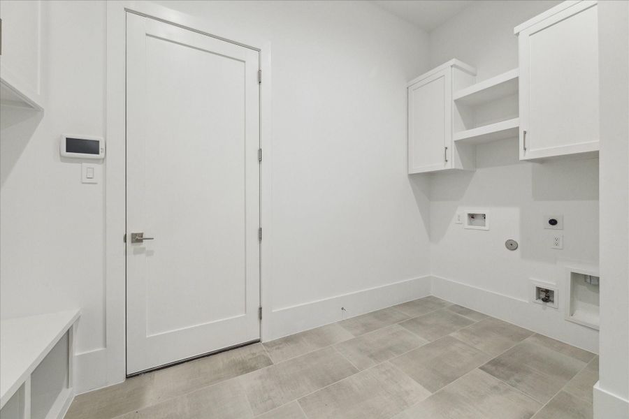 Mudroom leades to 3-car garage Mudroom leades to 3-car garage