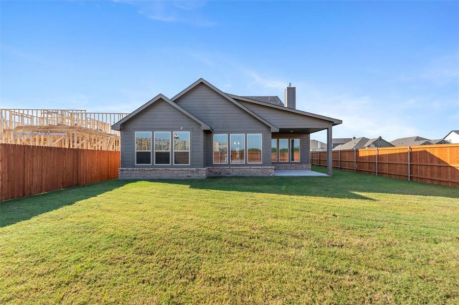 Exterior details and patio area of a home in Northstar, Haslet (Image 1).