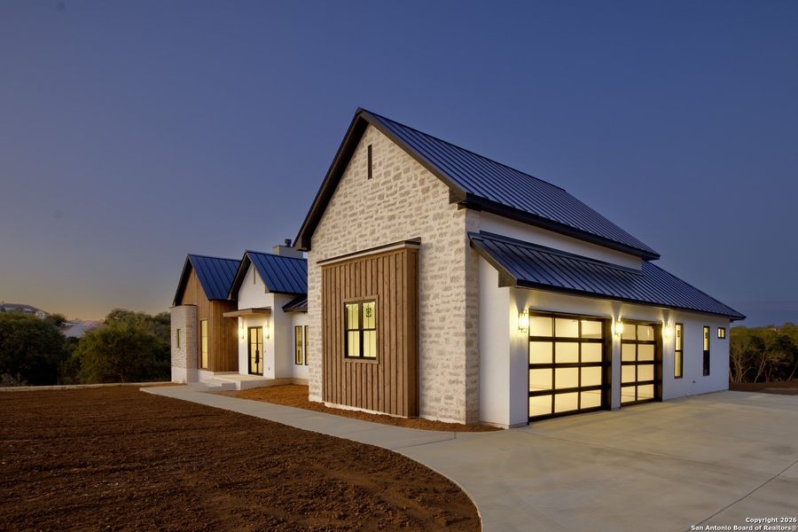 Front exterior of a new home in , New Braunfels, TX, highlighting curb appeal (Image 25).