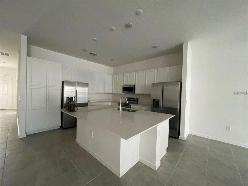 Furnished interior view inside a new home in , Kissimmee (Image 7).