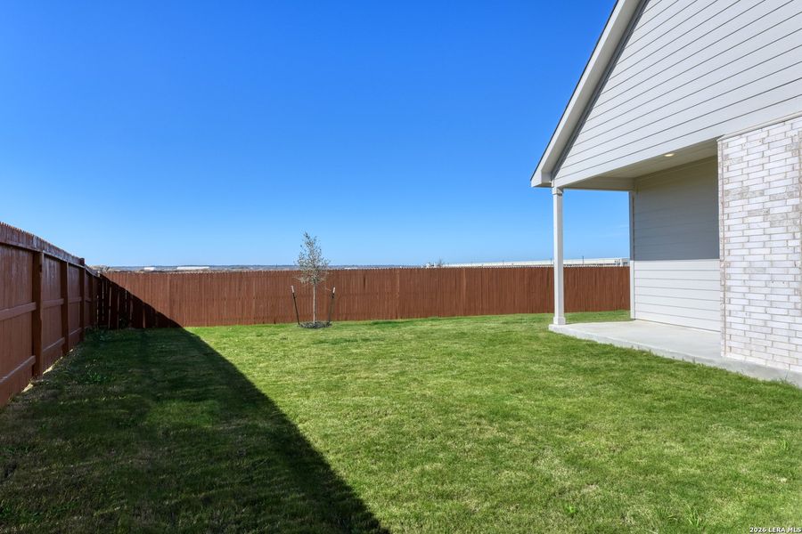 Exterior details and patio area of a home in Megan's Landing, Castroville (Image 23).