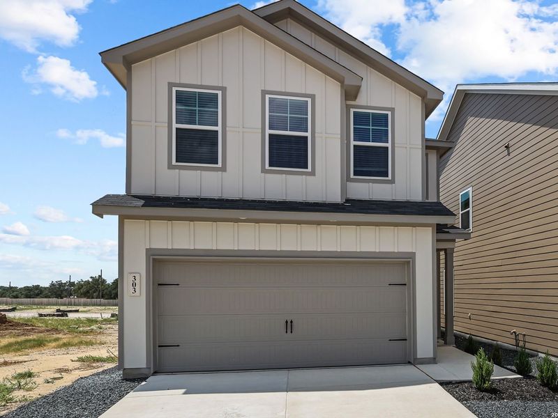 Front exterior of a new home in Meadows at Oak Creek, San Antonio, TX, highlighting curb appeal (Image 22).