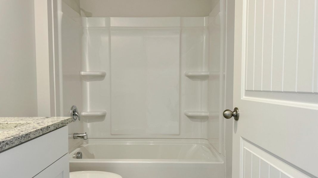 Representative furnished interior of a home built from the Roland by D.R. Horton in Huntington Estates, Millington (Image 8).