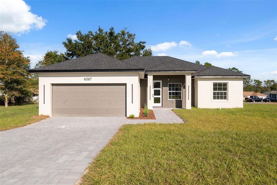 Front exterior of a new home in , Ocala, FL, highlighting curb appeal (Image 18).