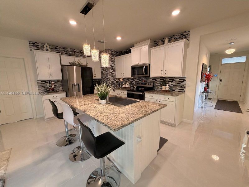 Furnished interior view inside a new home in , Port St. Lucie (Image 26).