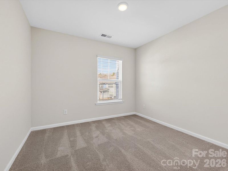 Spacious, unfurnished interior of a new home in North Creek Village, Huntersville (Image 25).