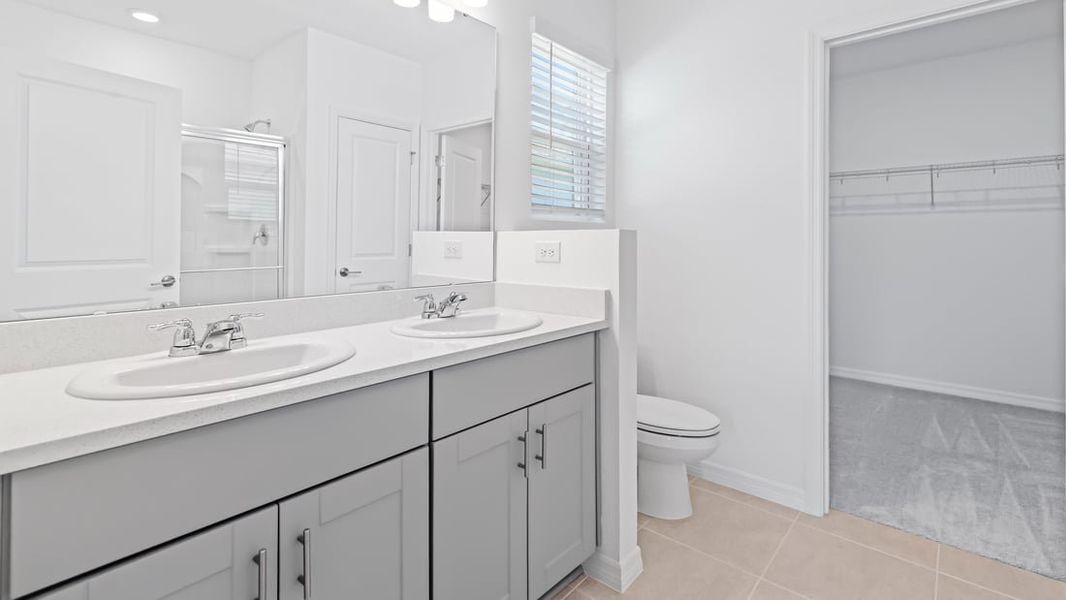 Representative furnished interior of a home built from the Ambrosia by Taylor Morrison in Aden South at Westview, Kissimmee (Image 8).