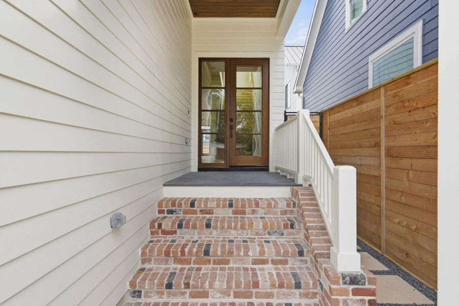 Exterior details and patio area of a home in , Houston (Image 25).
