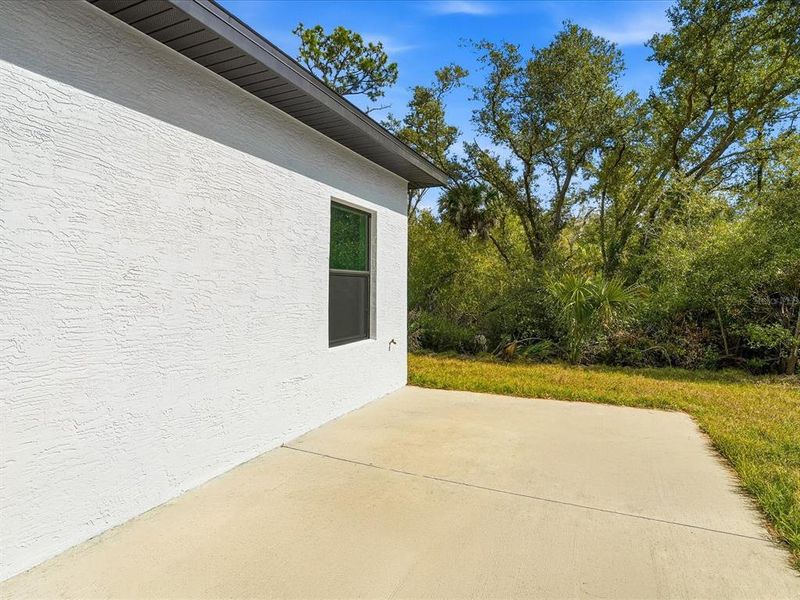 Exterior details and patio area of a home in , Port Charlotte (Image 18).