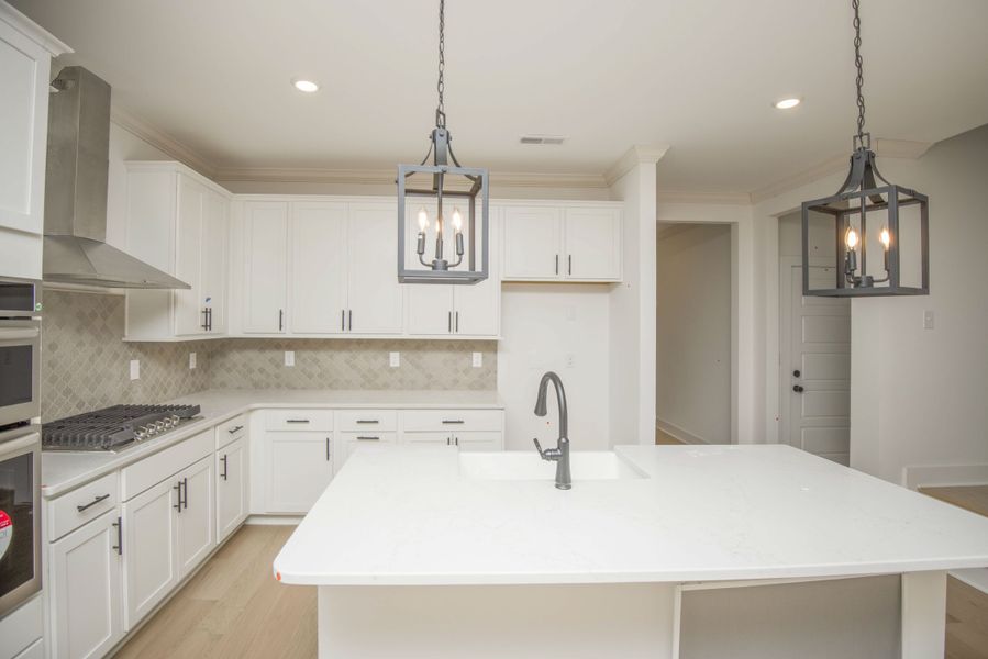 *Photo of example home. Selections and Finishes May Vary.*