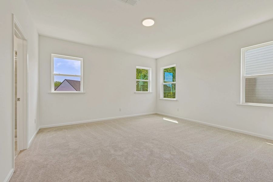 Spacious, unfurnished interior of a new home in Rowland's Grant, Fuquay Varina (Image 25).