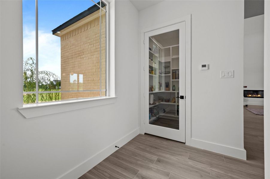 Space between garage door and pantry next to kitchen.