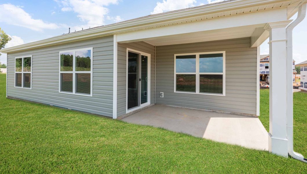 Front exterior of a new home in Waverly Station, Greenwood, SC, highlighting curb appeal (Image 17).