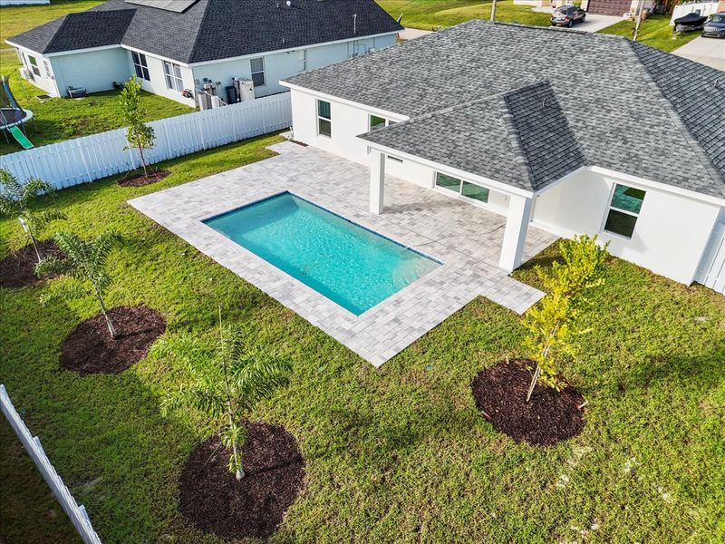 Representative exterior details of a home built from the The Sunset Harbor with Pool by Sunlife Homes LLC in Cape Coral, Cape Coral (Image 30). Representative exterior details of a home built from the The Sunset Harbor with Pool by Sunlife Homes LLC in Cape Coral, Cape Coral (Image 30).