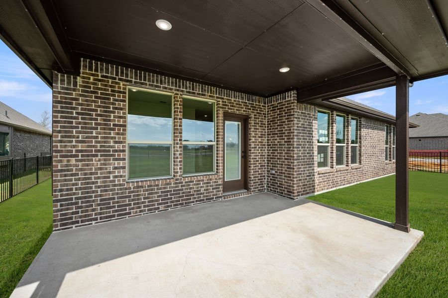 Exterior details and patio area of a home in Abe’s Landing, Granbury (Image 3). Exterior details and patio area of a home in Abe’s Landing, Granbury (Image 3).