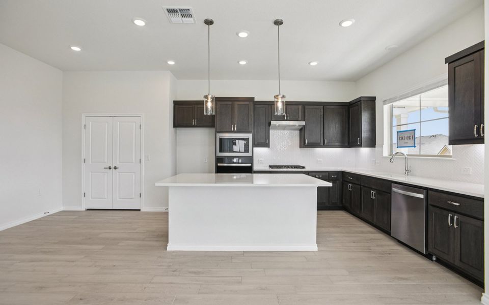 Furnished interior view inside a new home in Villas at Kissing Tree, San Marcos (Image 7).
