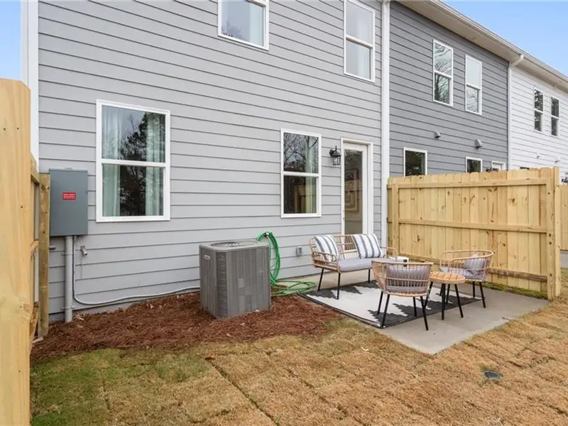 Exterior details and patio area of a home in Stegall Village, Emerson (Image 3).