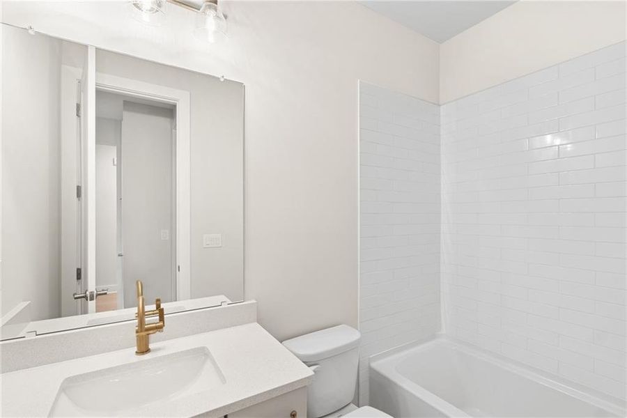 Furnished interior view inside a new home in Maple Grove at Towne Lake, Woodstock (Image 5).