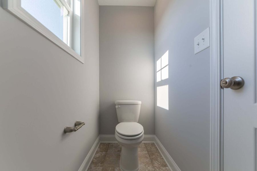 Representative furnished interior of a home built from the Aberdeen by Caviness & Cates Communities in Bartlett Manor, Youngsville (Image 194).
