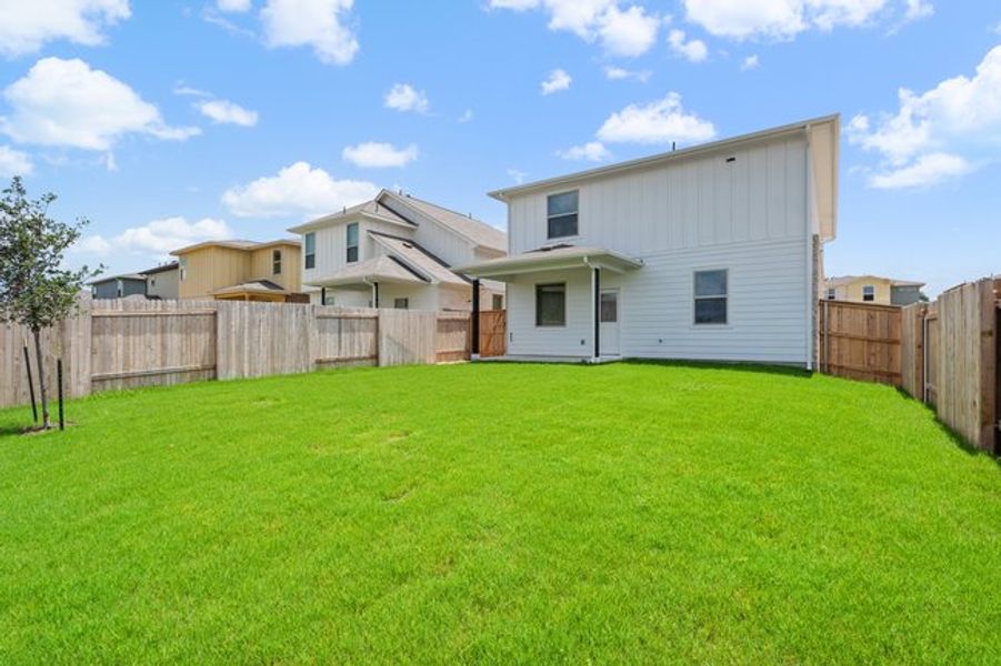 Front exterior of a new home in Crosswinds, Kyle, TX, highlighting curb appeal (Image 17).