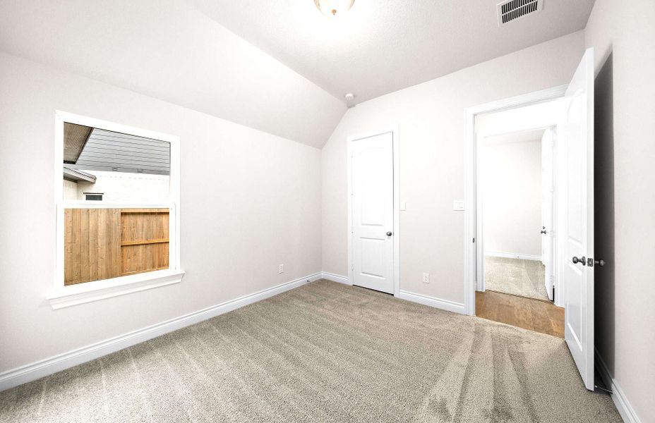 Representative unfurnished interior of a home built from the 2406 by Ravenna Homes in The Highlands 55′, Porter (Image 39).