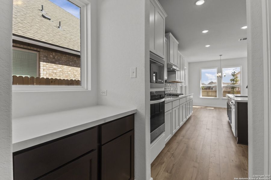 Furnished interior view inside a new home in Stillwater Ranch 60', San Antonio (Image 8).