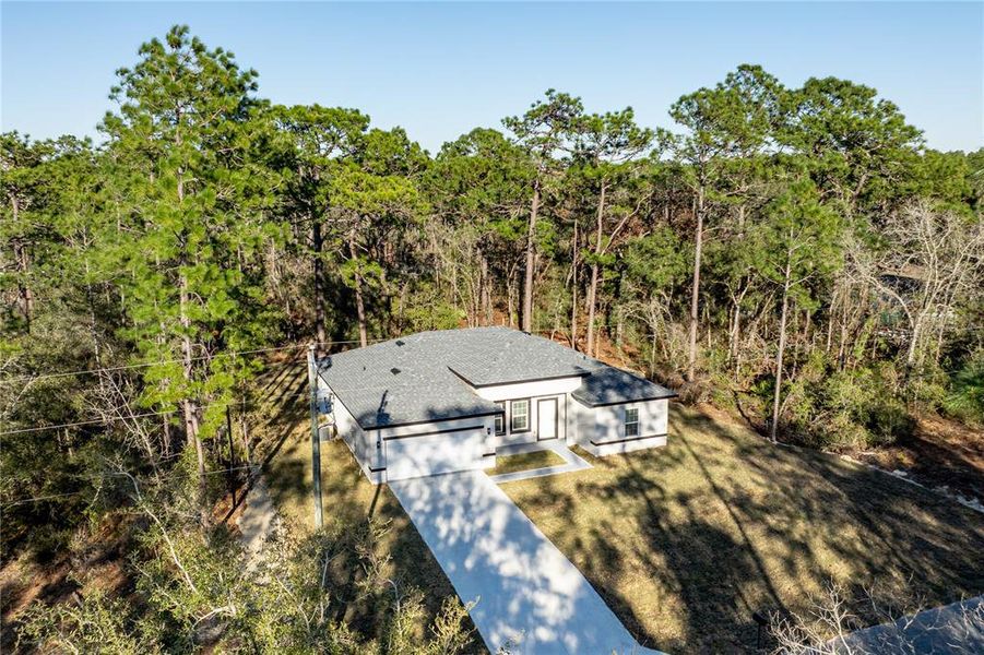 Front exterior of a new home in , Citrus Springs, FL, highlighting curb appeal (Image 19).