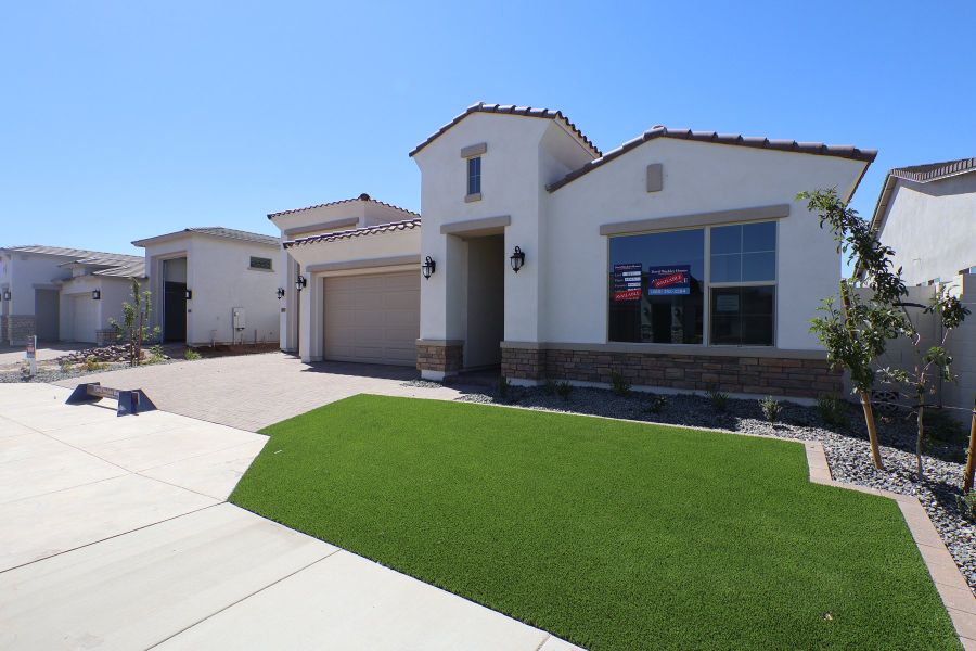 Front exterior of a new home in Tamber at Soleo, San Tan Valley, AZ, highlighting curb appeal (Image 2). Front exterior of a new home in Tamber at Soleo, San Tan Valley, AZ, highlighting curb appeal (Image 2).