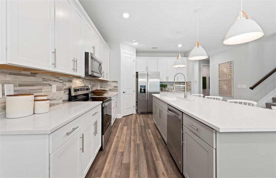 Furnished interior view inside a new home in The Strand at Cedar Grove, North Port (Image 23). Furnished interior view inside a new home in The Strand at Cedar Grove, North Port (Image 23).