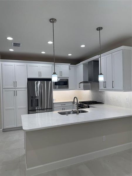 Furnished interior view inside a new home in Valencia Ridge (55+), Wesley Chapel (Image 6).