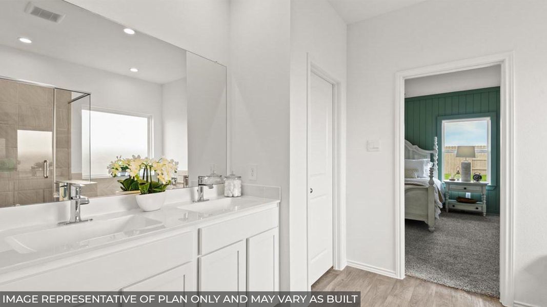 Furnished interior view inside a new home in Sunterra, Katy (Image 23).