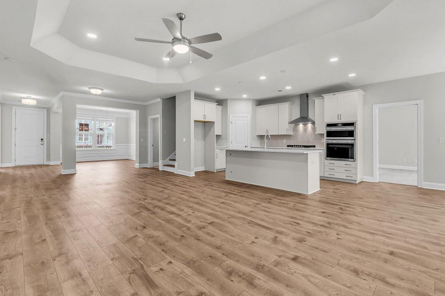 Spacious, unfurnished interior of a new home in Tidewater at Lakes of Cane Bay, Summerville (Image 30).