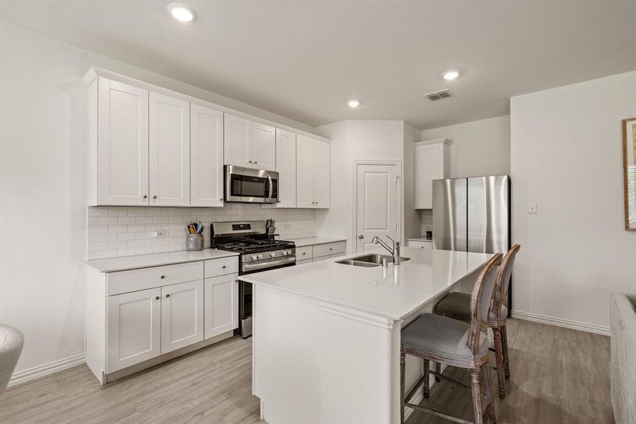 Furnished interior view inside a new home in Hurricane Creek: Classic 60s, Anna (Image 15). Furnished interior view inside a new home in Hurricane Creek: Classic 60s, Anna (Image 15).