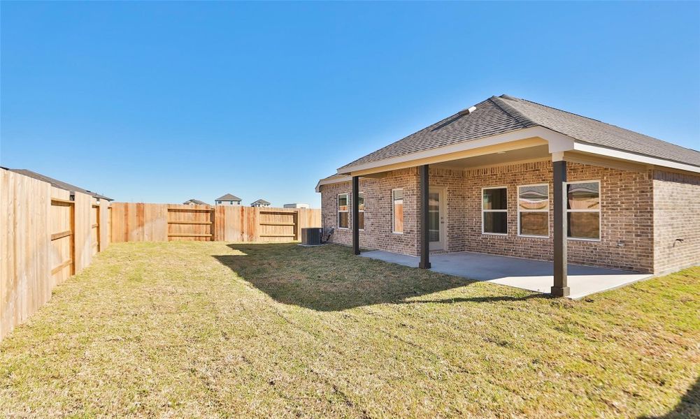 Exterior details and patio area of a home in River Ranch, Dayton (Image 18).