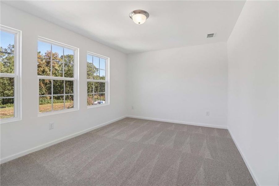 Spacious, unfurnished interior of a new home in The Pointe at Heron Bay, Locust Grove (Image 25).
