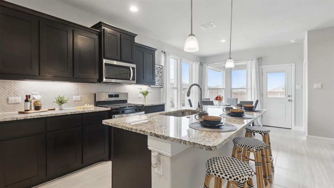 Kitchen - All Home and community information, including pricing, included features, terms, availability and amenities, are subject to change at any time without notice or obligation. All Drawings, pictures, photographs, video, square footages, floor plans, elevations, features, colors and sizes are approximate for illustration purposes only and will vary from the homes as built.