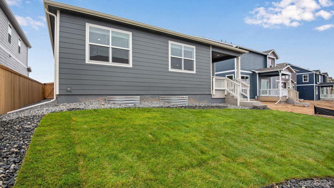 Exterior details and patio area of a home in Trails at Crowfoot, Parker (Image 28).