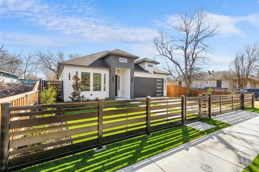 Front exterior of a new home in , Dallas, TX, highlighting curb appeal (Image 26).