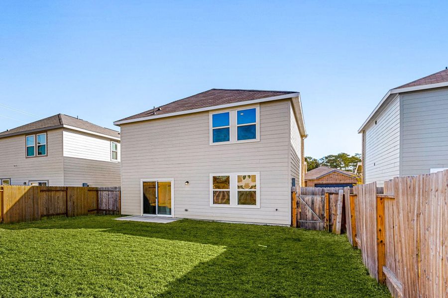 Exterior details and patio area of a home in , Houston (Image 4). Exterior details and patio area of a home in , Houston (Image 4).