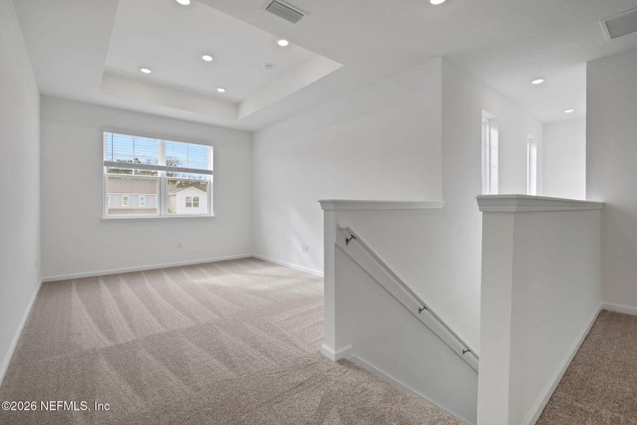 Spacious, unfurnished interior of a new home in The Hammock at Palm Harbor, Palm Coast (Image 32).