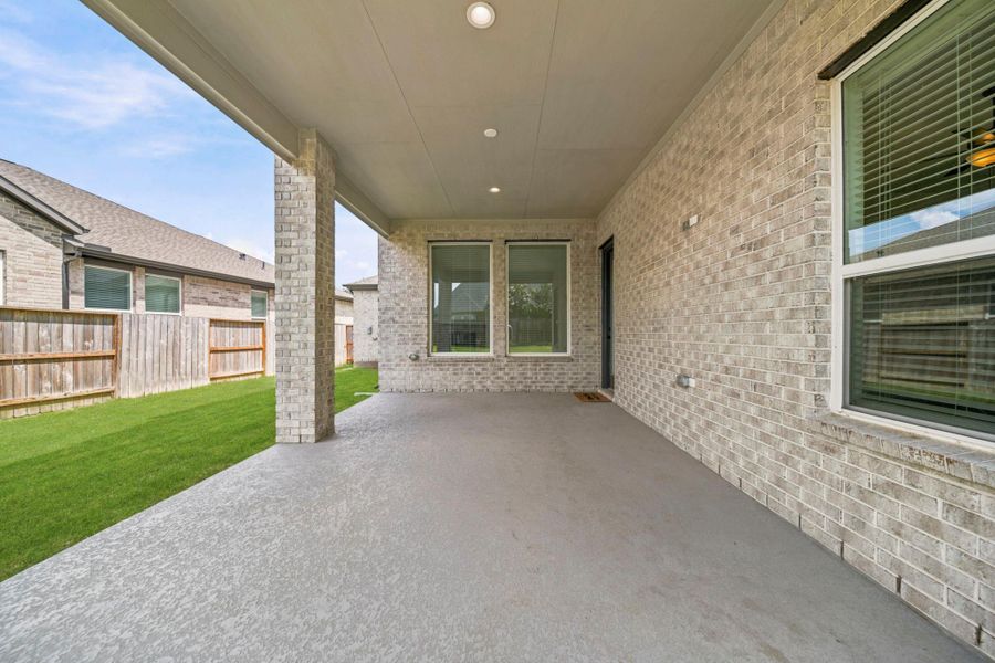 The covered patio is perfect for your outdoor living space, patio furniture, BBQ pit, and so much more! It connects to the kitchen, making it easy for indoor-outdoor living.